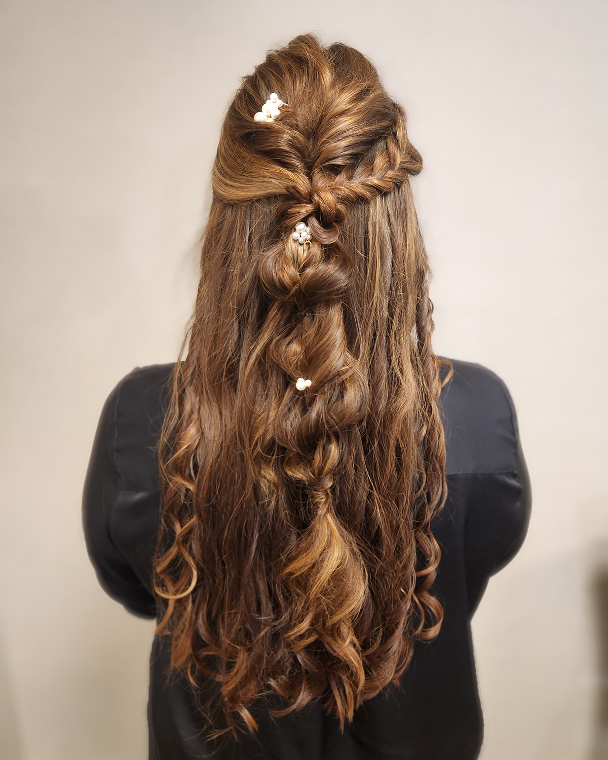 long sandy coloured hair with braids and curls